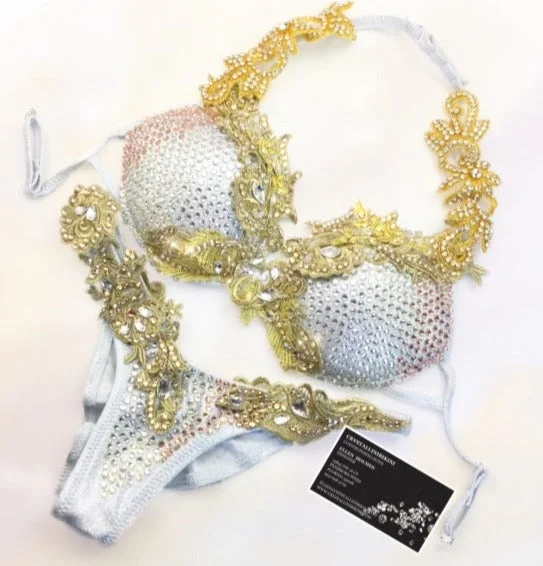 white and gold WBFF competition bikini